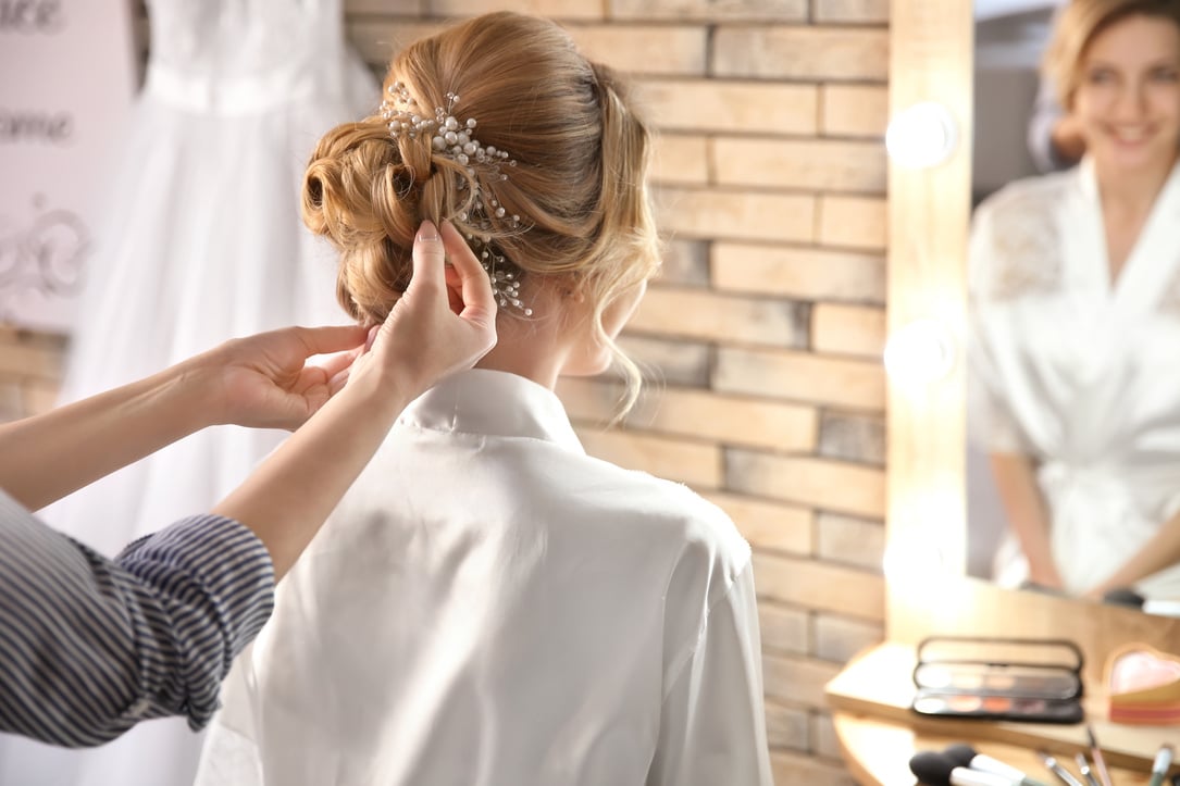 Hairdresser Styling Hair of the Bride